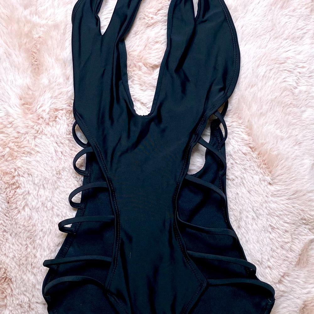 One piece swimsuit with cut outs